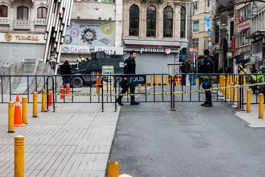 TURKEY, Istanbul: Police secure the area following a suicide bombing in a major shopping and tourist district at Istiklal street in the central part of the city on March 19, 2016 in Istanbul, Turkey. The explosion killed at least five people and left many injured.