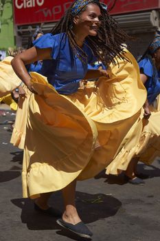 Group of dancers of Africa descent (Afrodescendiente) performing at the annual Carnaval Andino con la Fuerza del Sol in Arica, Chile.
