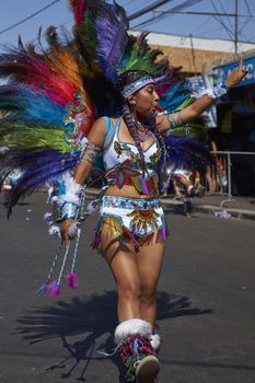 Tobas dancer in traditional Andean costume performing at the annual Carnaval Andino con la Fuerza del Sol in Arica, Chile.