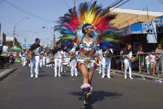 Tobas dancers in traditional Andean costume performing at the annual Carnaval Andino con la Fuerza del Sol in Arica, Chile.