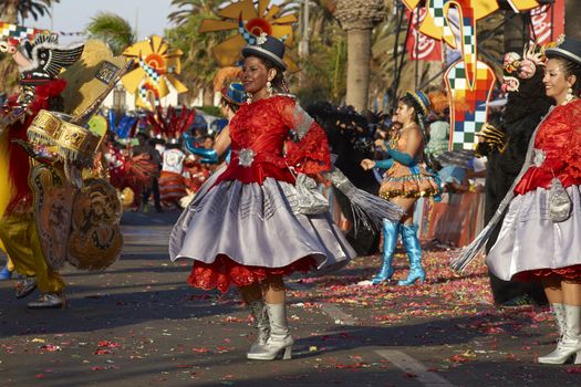 Morenada dancers in traditional Andean costume performing at the annual Carnaval Andino con la Fuerza del Sol in Arica, Chile.
