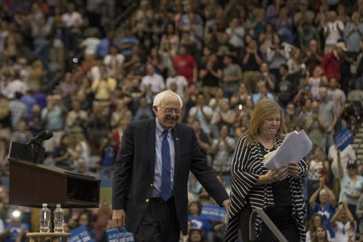 USA, Arizona: U.S. Sen. Bernie Sanders exits the stage with his wife Jane after speaking to a crowd of more than 5,000 at a Future to Believe In rally in Tucson Friday, March 18, 2016.