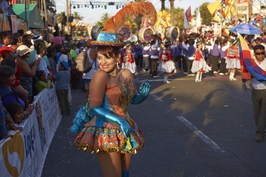 Morenada dancer in traditional Andean costume performing at the annual Carnaval Andino con la Fuerza del Sol in Arica, Chile.