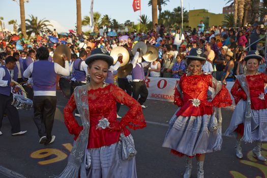 Morenada dancers in traditional Andean costume performing at the annual Carnaval Andino con la Fuerza del Sol in Arica, Chile.