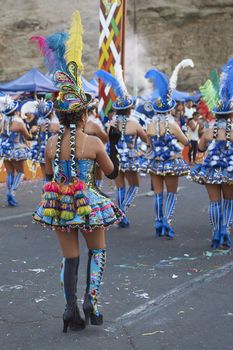 Morenada dancers in traditional Andean costume performing at the annual Carnaval Andino con la Fuerza del Sol in Arica, Chile.