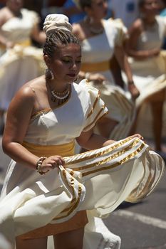 Group of dancers of Africa descent Afrodescendiente performing at the annual Carnaval Andino con la Fuerza del Sol in Arica, Chile.