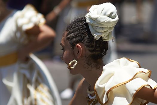 Group of dancers of Africa descent Afrodescendiente performing at the annual Carnaval Andino con la Fuerza del Sol in Arica, Chile.