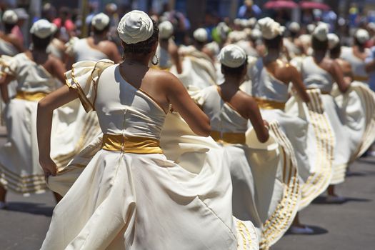 Group of dancers of Africa descent Afrodescendiente performing at the annual Carnaval Andino con la Fuerza del Sol in Arica, Chile.