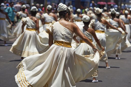 Group of dancers of Africa descent Afrodescendiente performing at the annual Carnaval Andino con la Fuerza del Sol in Arica, Chile.