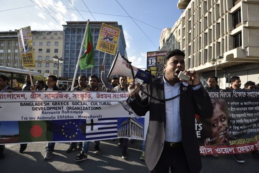 GREECE, Athens: Migrants march in central Athens holding banners and shouting slogans on March 19, 2016.Hundreds of migrants and supporters took part in a protest march in central Athens, condemning border fences and the NATO involvement in the refugee crisis. The protesters are calling for open borders to help the influx of migrants who are struggling in camps.