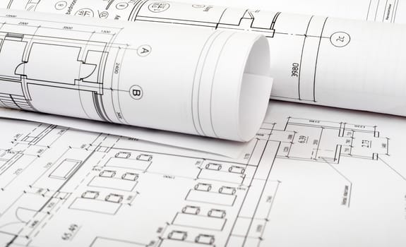 Rolls of blueprints, close up view. Building concept