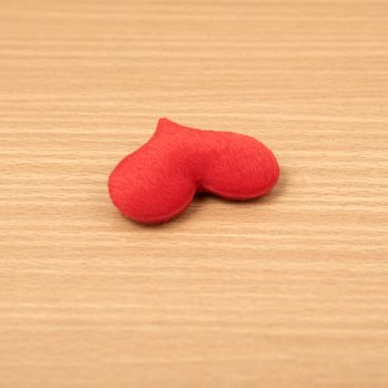 red heart on wood table background