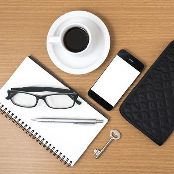 coffee and phone with notepad,key,eyeglasses and wallet on wood table background