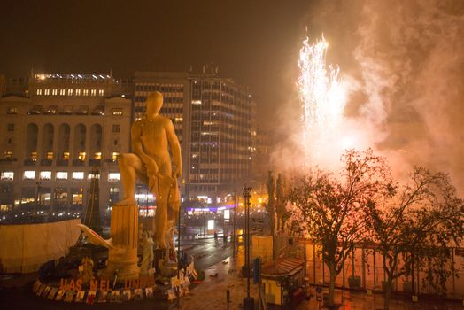 SPAIN, Valencia : Ninots burn on the last night of the Fallas Festival in Valencia on March 19, 2016.Fallas are gigantic structures made of cardboard portraying current events and personalities in which individual figures or Ninots are placed. The Fallas are burnt in the streets of Valencia as a tribute to St Joseph, patron saint of the carpenters' guild. 