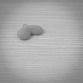 red heart on wood table background black and white color