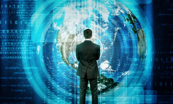Businessman in front of holographic screen with earth globe. Elements of this image furnished by NASA