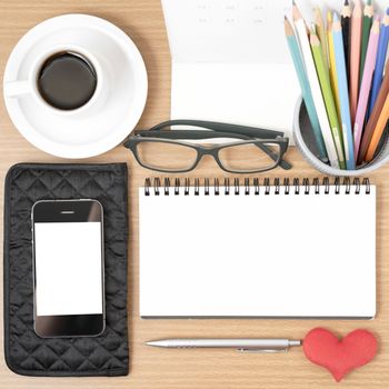 office desk : coffee with phone,wallet,calendar,color pencil box,notepad,heart on wood background