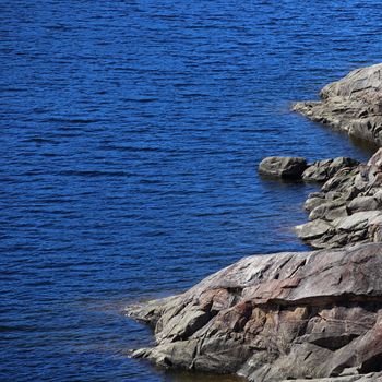 Sea shore with rocks, summer Norway landscape