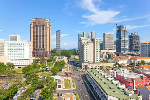 Construction of Skyscrapers at Bugis Streety Shopping District in Singapore daytime