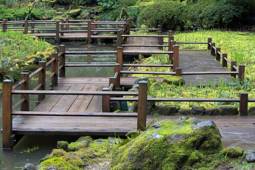 Wood Foot Bridge Walkway at Japanese Garden in Springtime