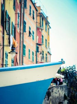 Travel Detail Of A Boat Against Historic Buildings In The Italian Cinque Terre Fishing Village Of Riomaggiore