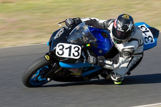 BROADFORD, VICTORIA/AUSTRALIA - MARCH 20: A mix of bikes and sidecars tussle against each other at Round 1 of the Interclub Series at The Broadford Motorcycle Complex near Melbourne.