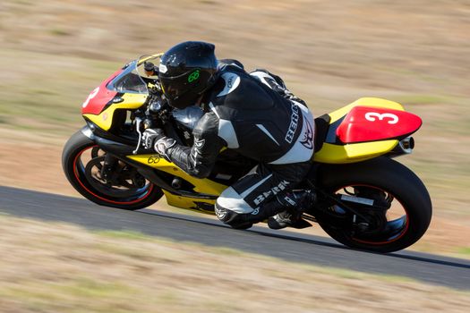 BROADFORD, VICTORIA/AUSTRALIA - MARCH 20: A mix of bikes and sidecars tussle against each other at Round 1 of the Interclub Series at The Broadford Motorcycle Complex near Melbourne.