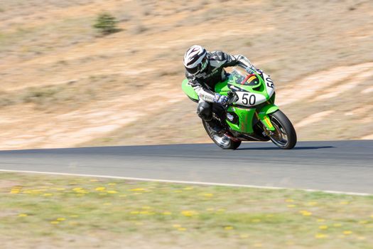 BROADFORD, VICTORIA/AUSTRALIA - MARCH 20: A mix of bikes and sidecars tussle against each other at Round 1 of the Interclub Series at The Broadford Motorcycle Complex near Melbourne.