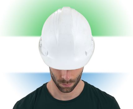 Isolated engineer with flag on background - Sierra Leone