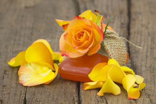 bar of natural soap and rose