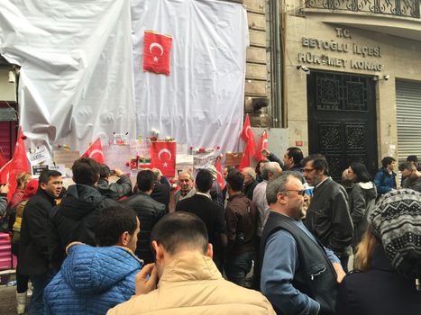 TURKEY, Istanbul: People gather at the site of a blast on Istiklal Street, a major shopping and tourist district, in central Istanbul on March 20, 2016 in tribute to four people killed during a suicide blast that ripped through Istanbul less than a week after another deadly attack left 35 dead in Ankara.