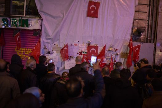 TURKEY, Istanbul: People gather at the site of a blast on Istiklal Street, a major shopping and tourist district, in central Istanbul on March 20, 2016, to pay tribute to four people killed during a suicide blast that ripped through Istanbul less than a week after another deadly attack left 35 dead in Ankara.