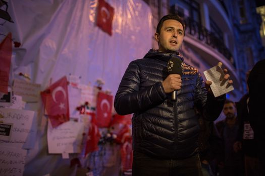 TURKEY, Istanbul: A TV reporter is pictured at the site of a blast on Istiklal Street, a major shopping and tourist district, in central Istanbul on March 20, 2016, as people pay tribute to four people killed during a suicide blast that ripped through Istanbul less than a week after another deadly attack left 35 dead in Ankara.