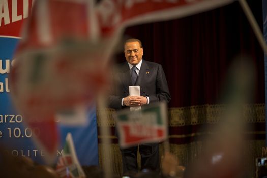 ITALY, Palermo: Former Italian Prime Minister Silvio Berlusconi waves his supporters during a meeting of his party Forza Italia, in Palermo, Sicily, on March 19, 2016. In June 2013, Berlusconi announced the refoundation of his first party Forza Italia.