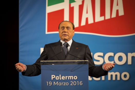 ITALY, Palermo: Former Italian Prime Minister Silvio Berlusconi waves his supporters during a meeting of his party Forza Italia, in Palermo, Sicily, on March 19, 2016. In June 2013, Berlusconi announced the refoundation of his first party Forza Italia.