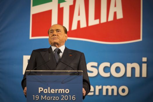 ITALY, Palermo: Former Italian Prime Minister Silvio Berlusconi waves his supporters during a meeting of his party Forza Italia, in Palermo, Sicily, on March 19, 2016. In June 2013, Berlusconi announced the refoundation of his first party Forza Italia.
