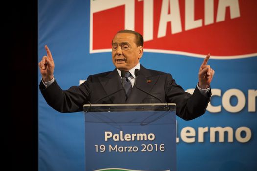 ITALY, Palermo: Former Italian Prime Minister Silvio Berlusconi waves his supporters during a meeting of his party Forza Italia, in Palermo, Sicily, on March 19, 2016. In June 2013, Berlusconi announced the refoundation of his first party Forza Italia.