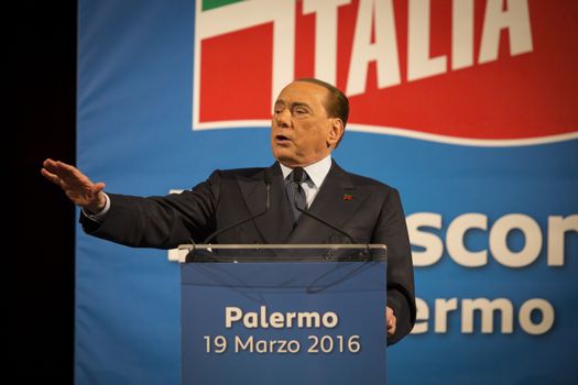 ITALY, Palermo: Former Italian Prime Minister Silvio Berlusconi waves his supporters during a meeting of his party Forza Italia, in Palermo, Sicily, on March 19, 2016. In June 2013, Berlusconi announced the refoundation of his first party Forza Italia.