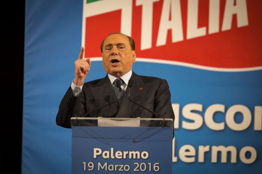 ITALY, Palermo: Former Italian Prime Minister Silvio Berlusconi waves his supporters during a meeting of his party Forza Italia, in Palermo, Sicily, on March 19, 2016. In June 2013, Berlusconi announced the refoundation of his first party Forza Italia.