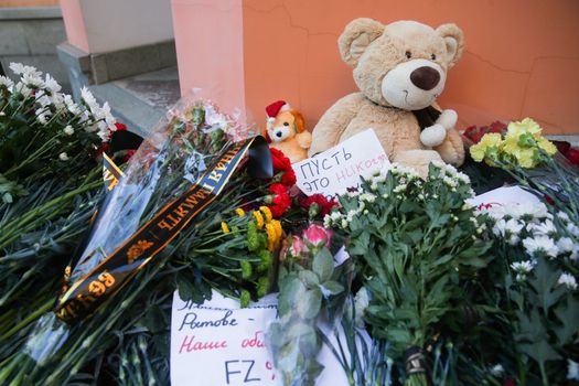 RUSSIA, Moscow: People bring flowers to the Moscow representative office of Rostov-on-Don city, on March 20, 2016 where passenger plane Boeing-737-800 crashed at landing. The plane crashed in southern Russia early on March 19, killing all 62 people on board as it tried to land in bad weather in the city of Rostov-on-Don.