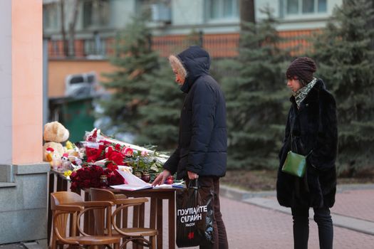 RUSSIA, Moscow: People bring flowers to the Moscow representative office of Rostov-on-Don city, on March 20, 2016 where passenger plane Boeing-737-800 crashed at landing. The plane crashed in southern Russia early on March 19, killing all 62 people on board as it tried to land in bad weather in the city of Rostov-on-Don.