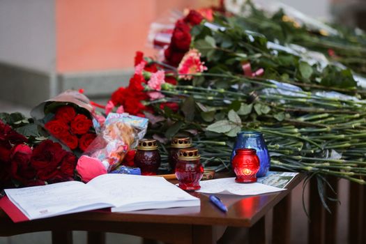 RUSSIA, Moscow: People bring flowers to the Moscow representative office of Rostov-on-Don city, on March 20, 2016 where passenger plane Boeing-737-800 crashed at landing. The plane crashed in southern Russia early on March 19, killing all 62 people on board as it tried to land in bad weather in the city of Rostov-on-Don.