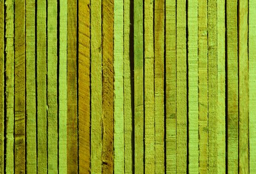 Green and Sand Colored Background of Cracked Wooden Plank closeup