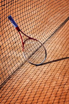 tennis background with tennis equipment on clay course