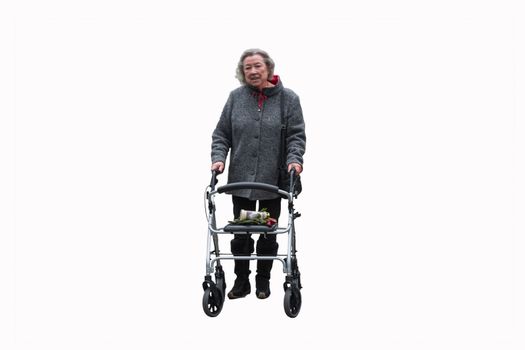 Elderly lady with a walker against white background.