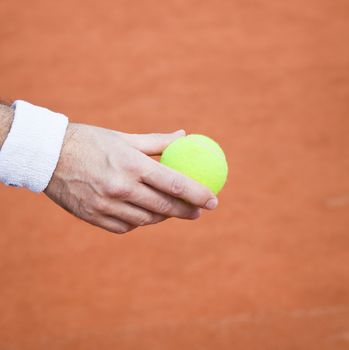 tennis background with tennis equipment on clay course