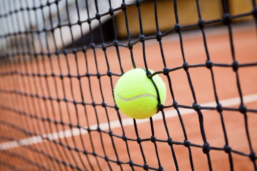 tennis background with tennis equipment on clay course