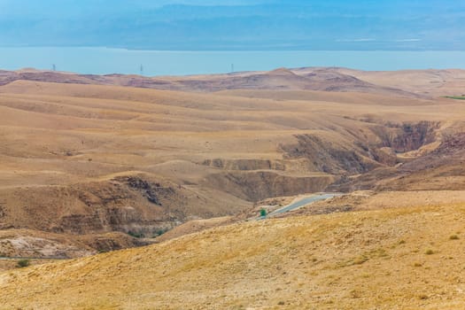 Sand and gravel hills and ravines in the mountain areas of Jordan. Desert mountain landscape