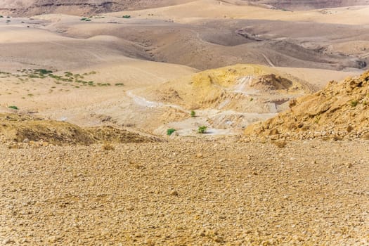 Sand and gravel hills and ravines in the mountain areas of Jordan. Desert mountain landscape