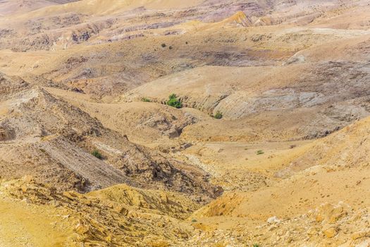 Sand and gravel hills and ravines in the mountain areas of Jordan. Desert mountain landscape